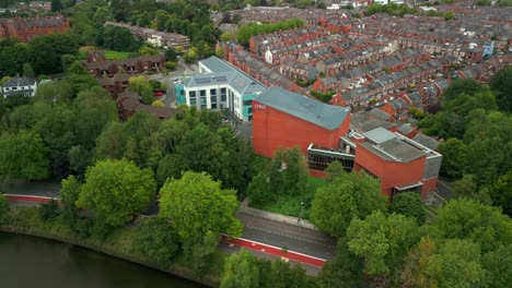 Overhead reversing aerial video of the Lyric Theatre in South Belfast, Northern Ireland in the UK. Filmed in 4K, 60FPS and with Rec709 color