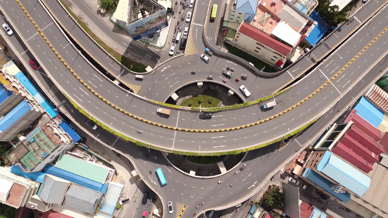 Morodok Techo Flyover in Phnom Penh, Cambodia road traffic transport aerial drone top-down view