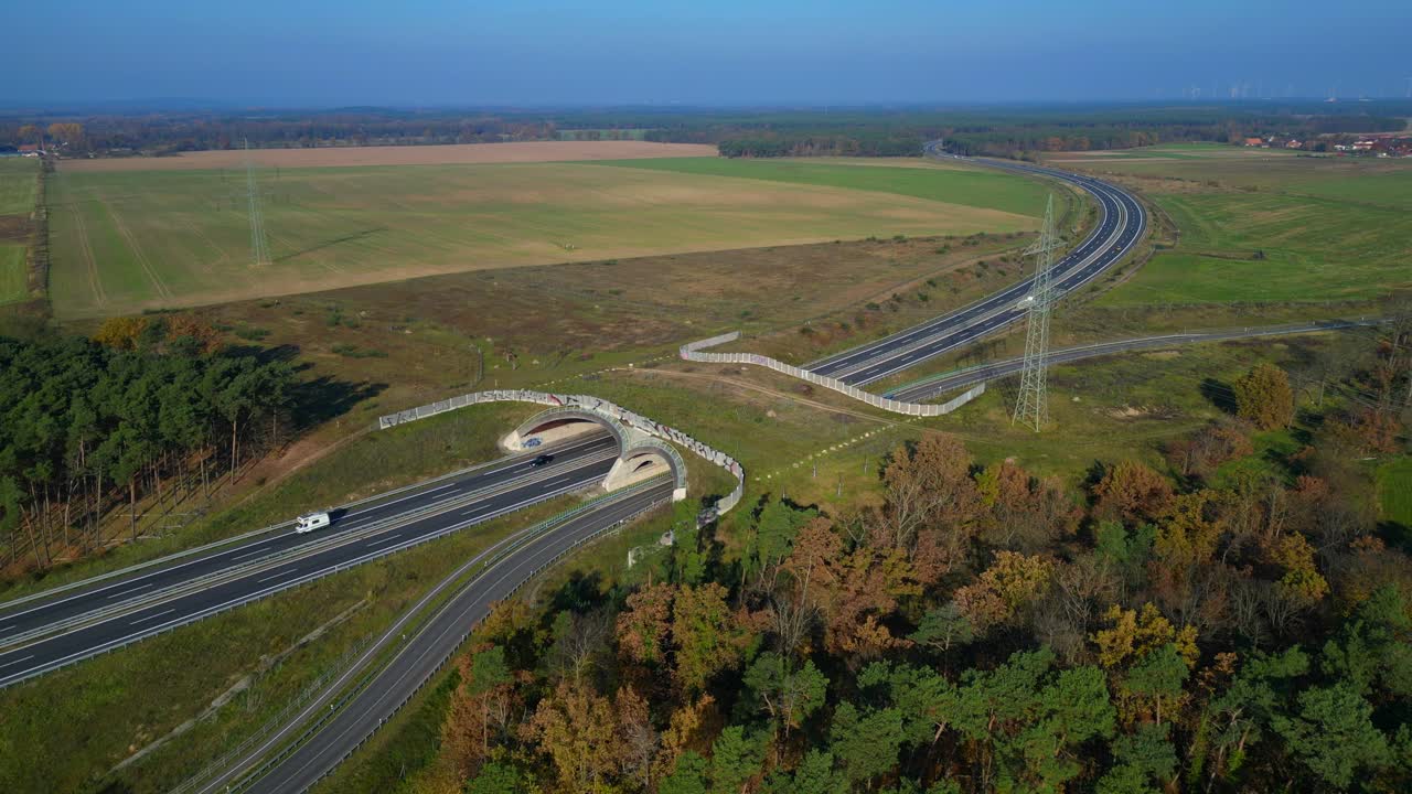 Wildlife crossings Ecoduct, ecopassage, nature ecopassage or green bridge, game changeover. highway in Germany Infrastructure for animals. Magic aerial view flight panorama static hovering drone