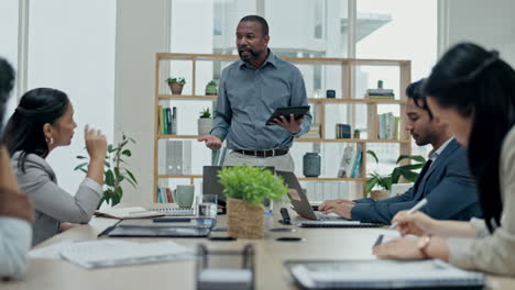 Businessman,-tablet-and-coach-in-meeting