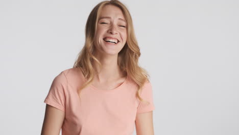 Caucasian-woman-happily-winking-on-camera.