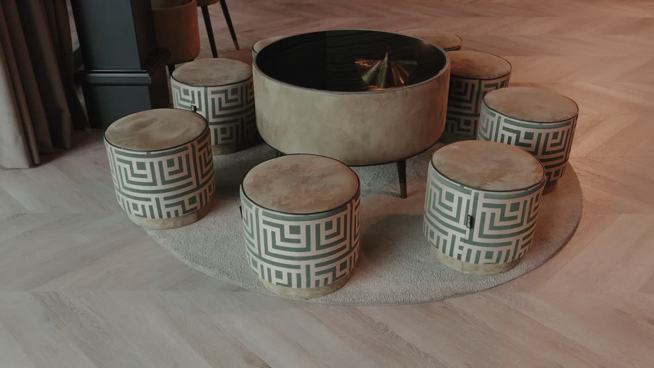 modern round stools and table set in stylish indoor lounge area