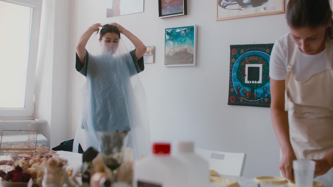 Women in an art studio working on a craft project
