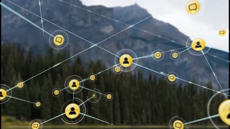 Animation-of-network-of-profile-icons-against-landscape-with-mountains-and-forest