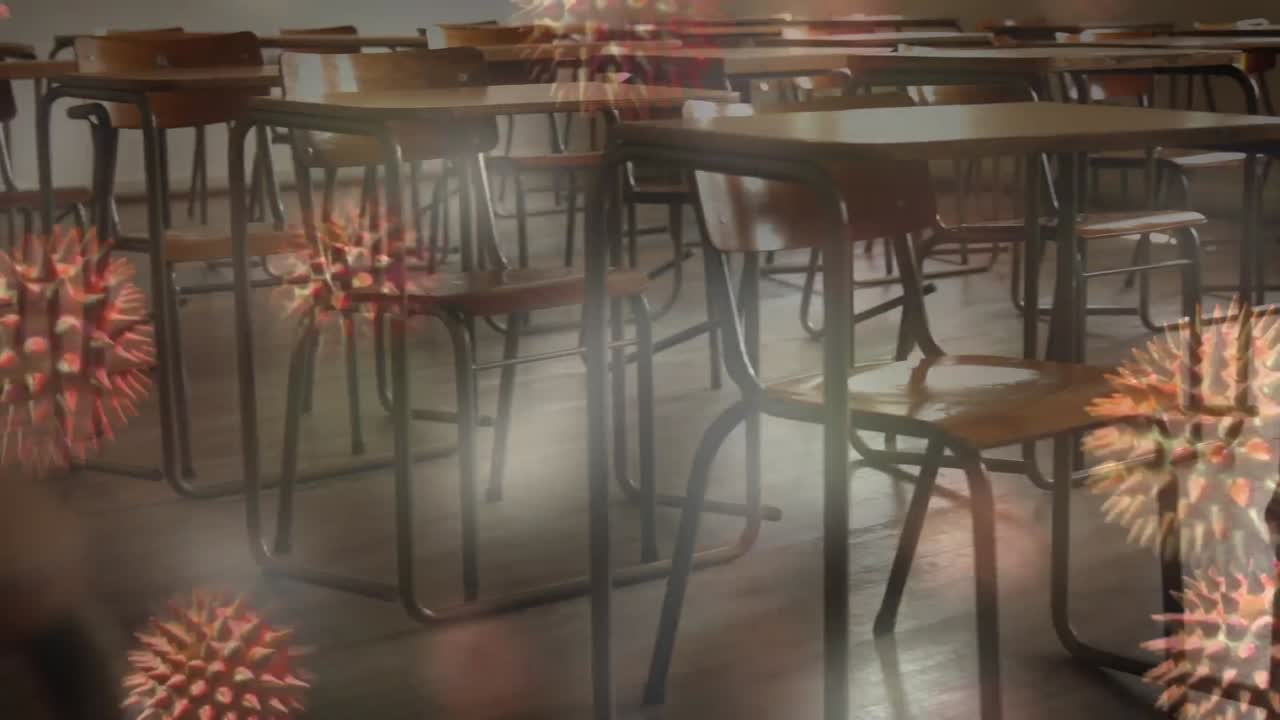 빈 학교 교실에서 확산되는 거대 코로나바이러스 코로나19 세포의 애니메이션