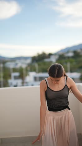 ballet dancer posing outdoors