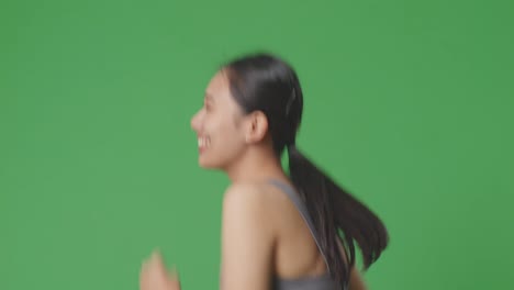 woman running in profile view