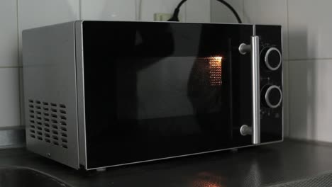 Turning-microwave-on-and-off--wideshot