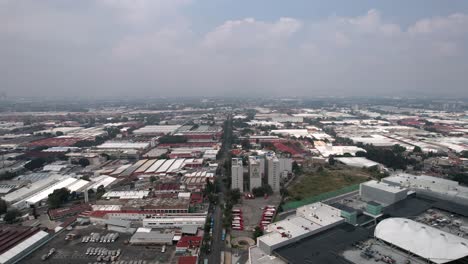 elevation drone shot of mexico city industrial zone