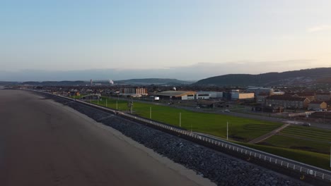 Rising-Aerial-View-of-Port-Talbot-at-Sunrise