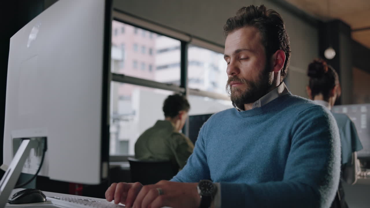Tired businessman working in office