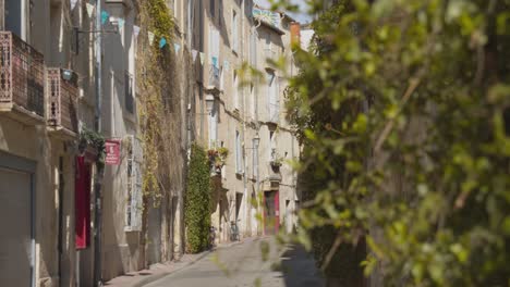 typical alleyway in medieval streets of montpellier in france