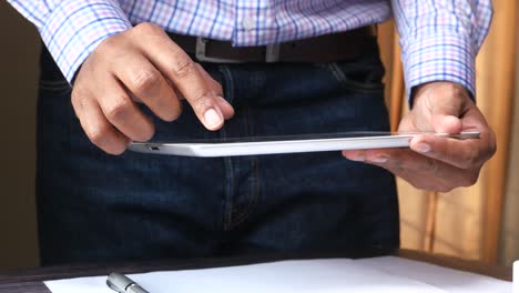 person using a tablet in an office