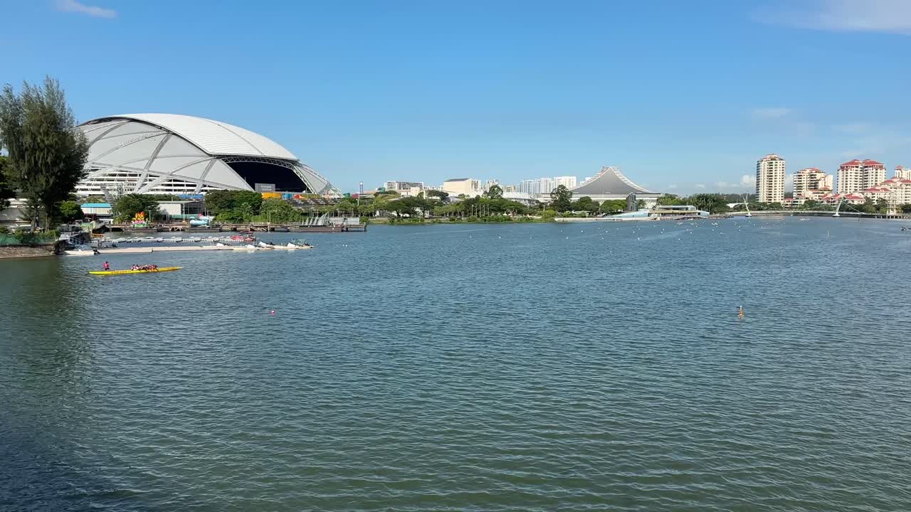 Singapore national sports stadium Modern with a retractable roof hosting football, rugby, cricket