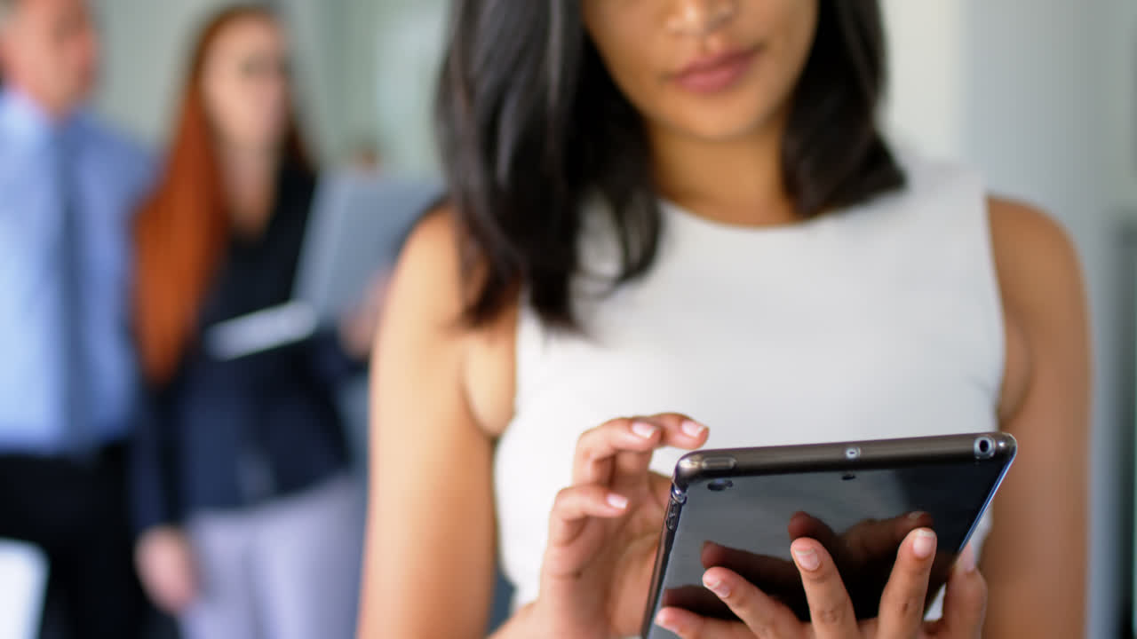 Businesswoman using digital tablet 4k