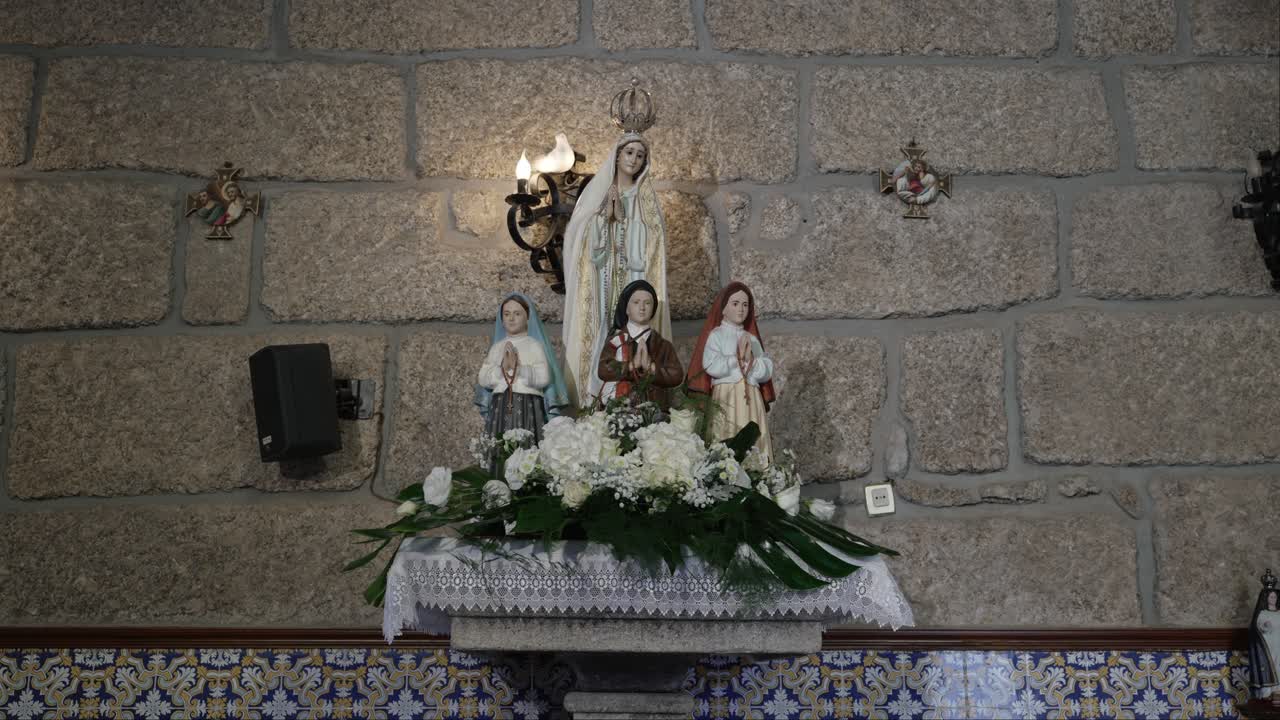 Religious altar with Our Lady of Fátima and three children in Portugal