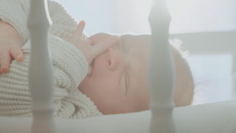baby sleeping in crib