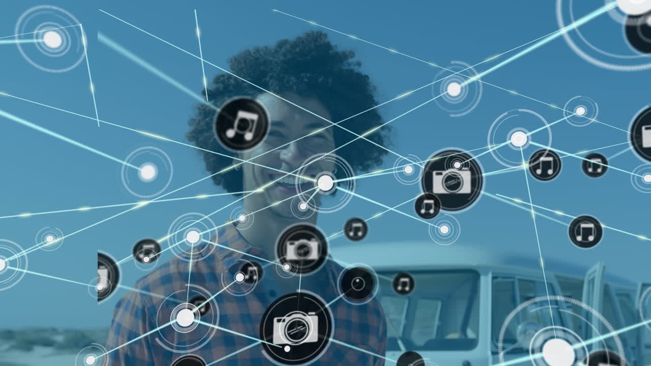 animación de la red de conexiones con los iconos de los medios sobre el feliz hombre afroamericano