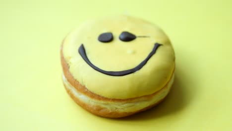 smiling yellow donut