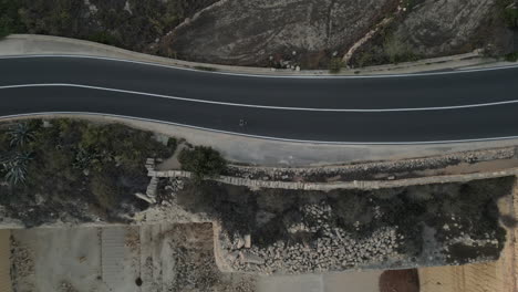 Aerial-Top-down-View-Of-A-Man-Running-Across-the-country