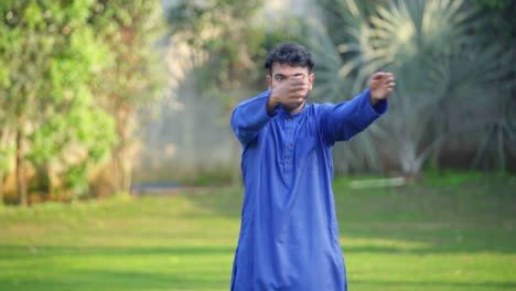 indian man exercising and stretching