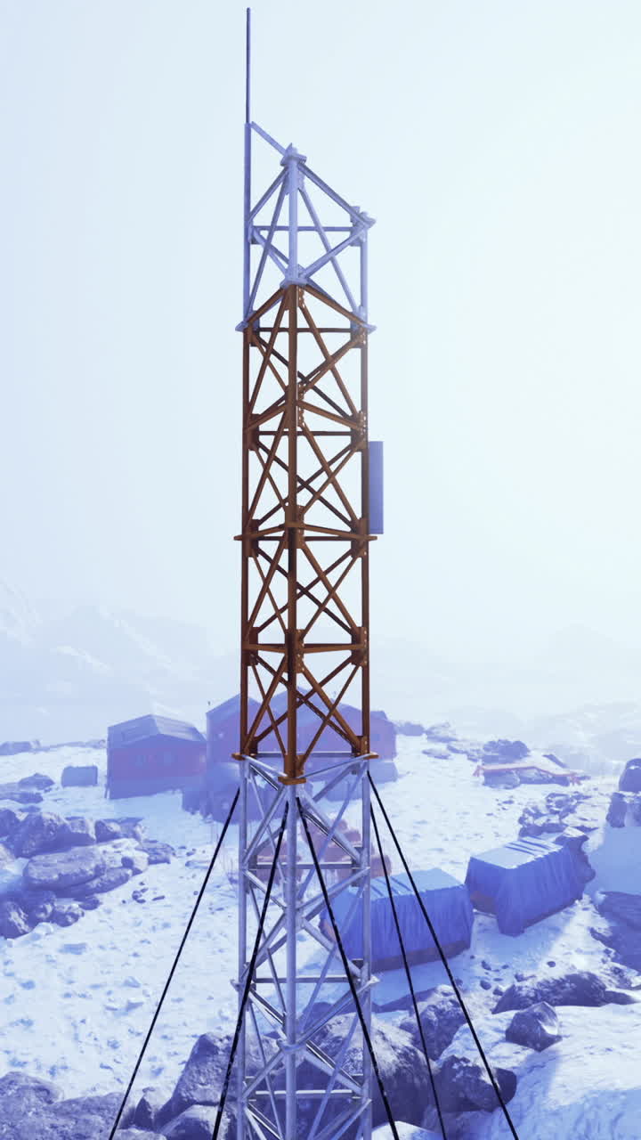 Winter landscape featuring communication towers amid snowy terrain