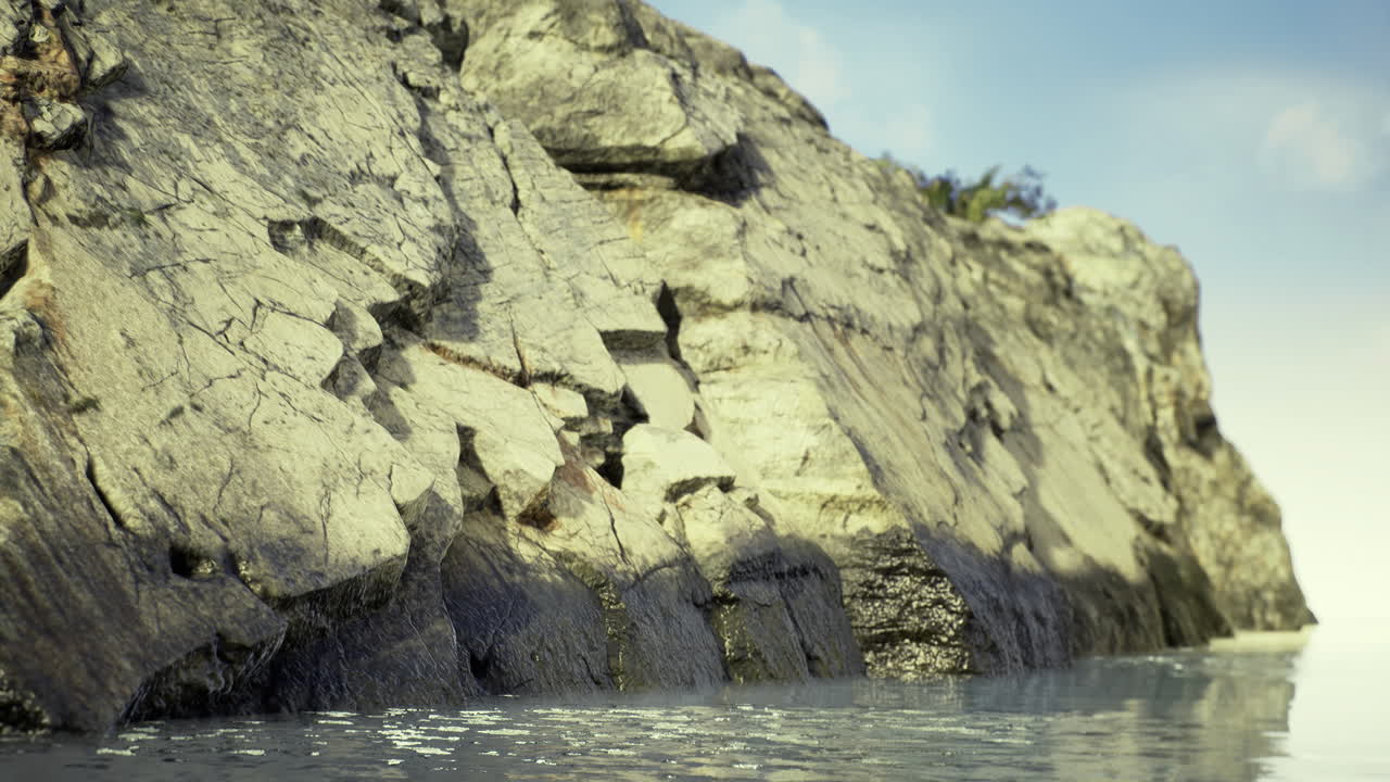 Calm waters reflecting serene cliffs in a peaceful coastal landscape