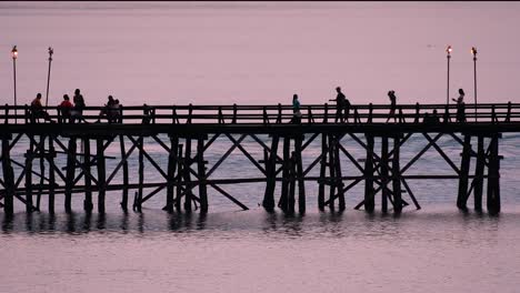 The-Mon-Bridge-is-an-old-wooden-bridge-located-in-Sangkla,-Thailand