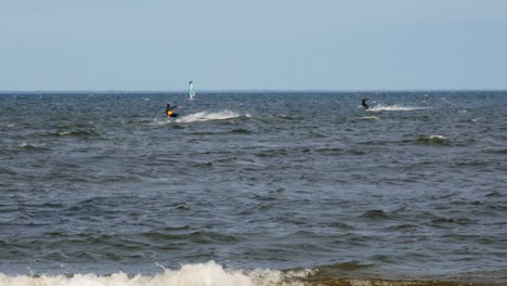 windsurfing and kitesurfing on the waves in poland