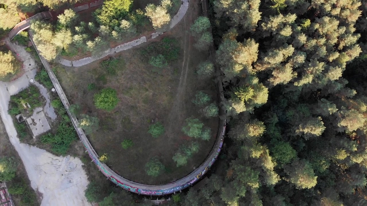 Aerial: Sarajevo Olympic Bobsleigh track in Trebević mountain. Zenital shot