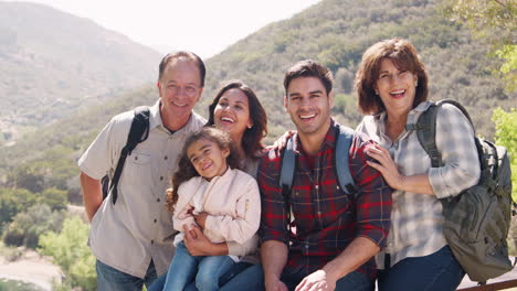 multi generation family take a break during a mountain hike