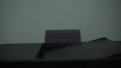a printer loading paper inside.
