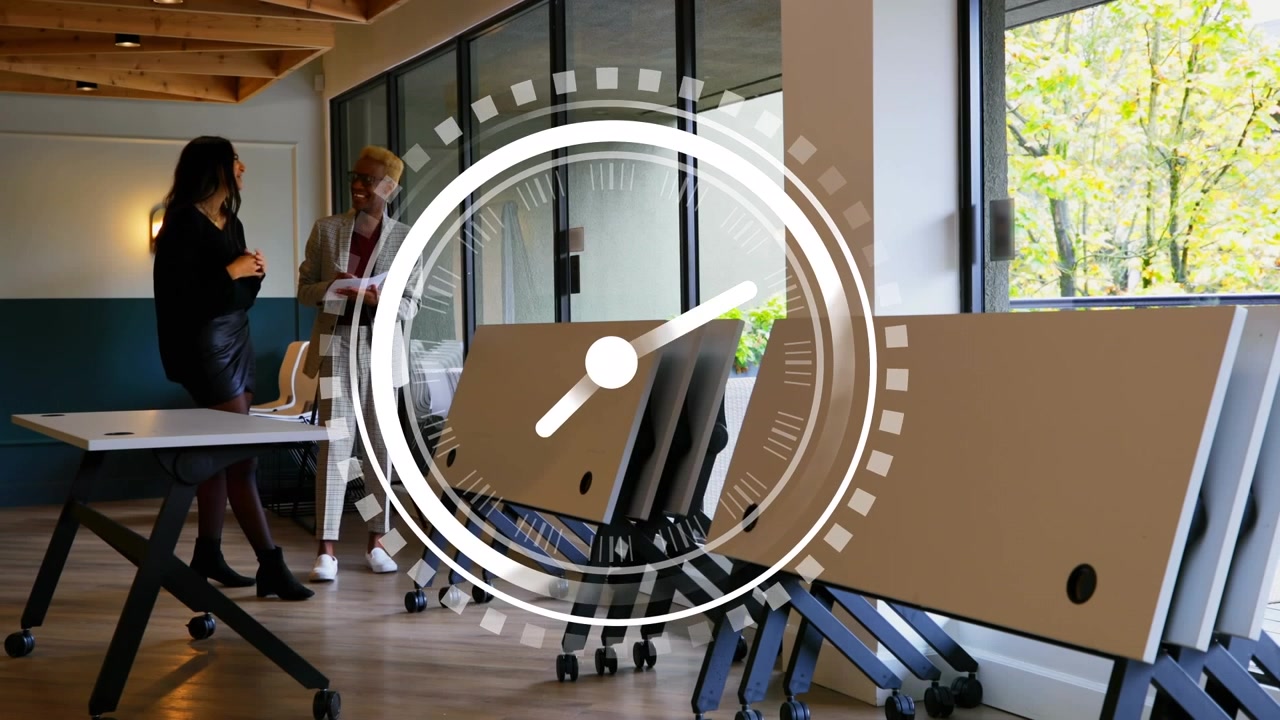 Animation of moving clock over diverse business people at office