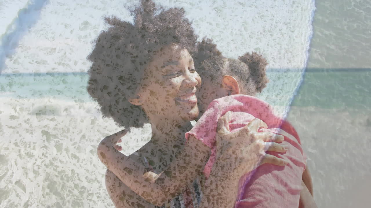 Donna che abbraccia un bambino sulla spiaggia, che mostra dati sulla salute con icone animate a forma di cuore e un grafico