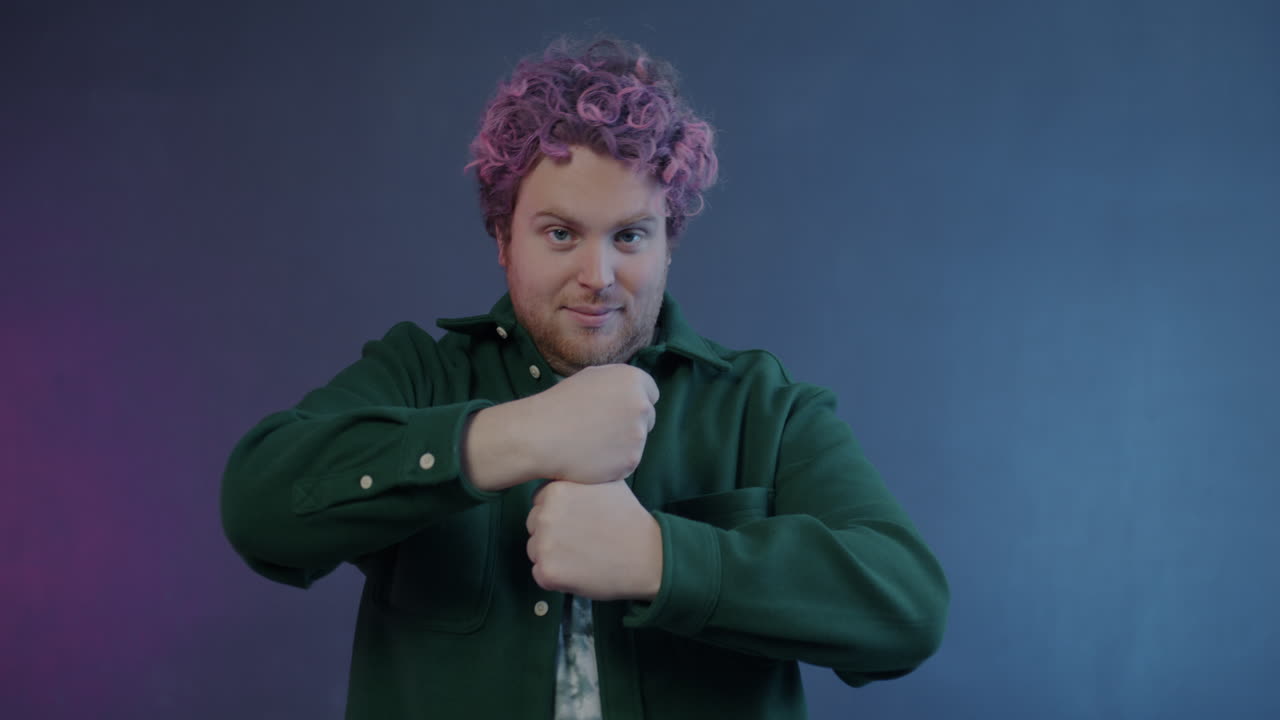 Man with Pink Curly Hair Posing