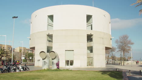 modern and circular building in barcelona on a sunny day