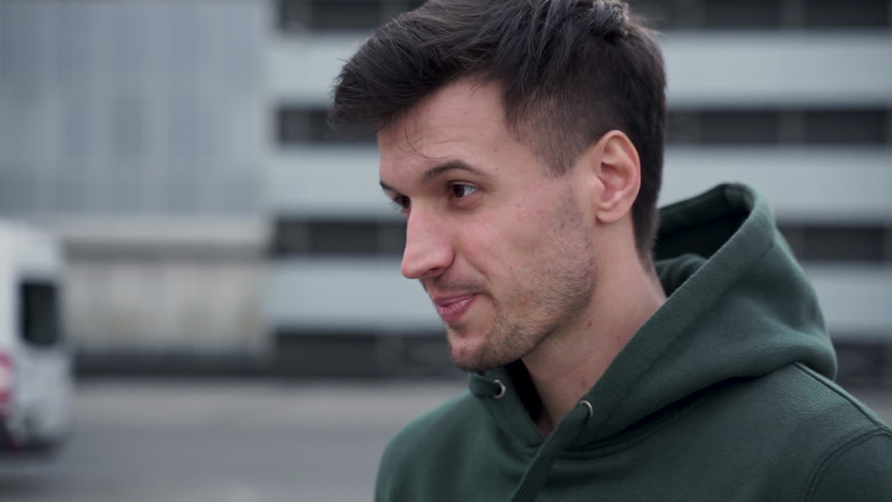 Handsome Man Looking At Camera And Smiling