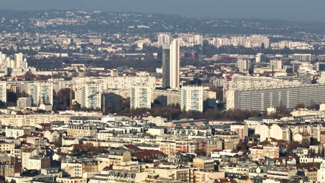 Aerial-Paris:-Iconic-buildings-rise-above,-history-whispers-amidst-the-pollution