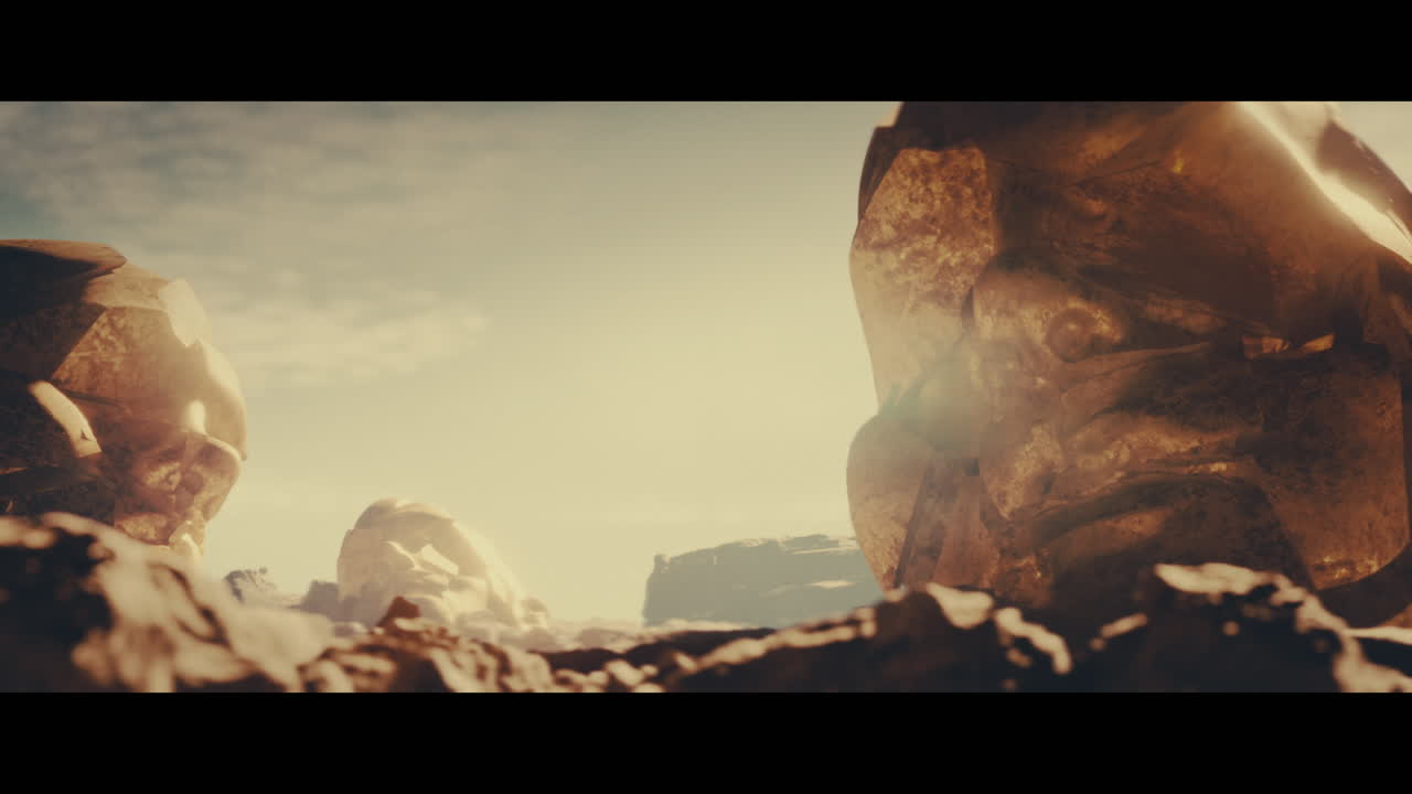 Huge golden statues in the desert during sunset