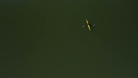 aerial view of crew member rowing her boat