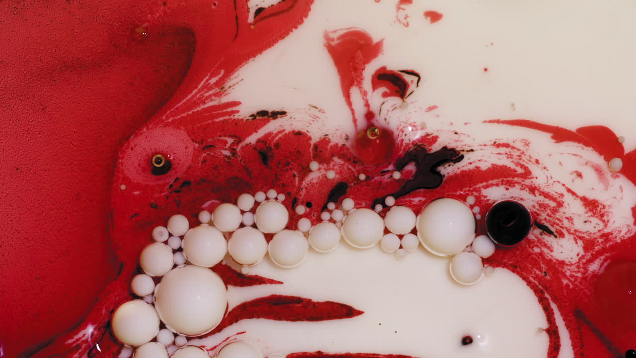 Red and cream colored acrylic paint mix, abstract fluid art background with Valentine's Day color scheme