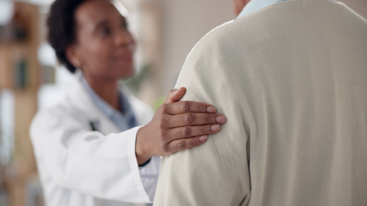 Doctor comforting patient with empathy and support