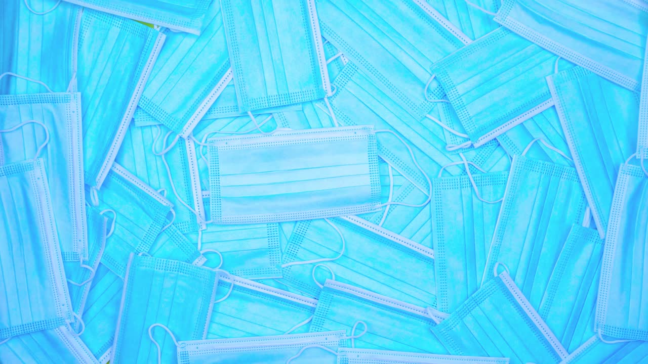 의료 보호 마스크의 스 모션 애니메이션 의약품 배경 개념 코로나 백신. 건강 보호 및 생명을 구하는. 스 모이션 애니메이션. 복사 공간 원활한 루프 비디오 시간 지연