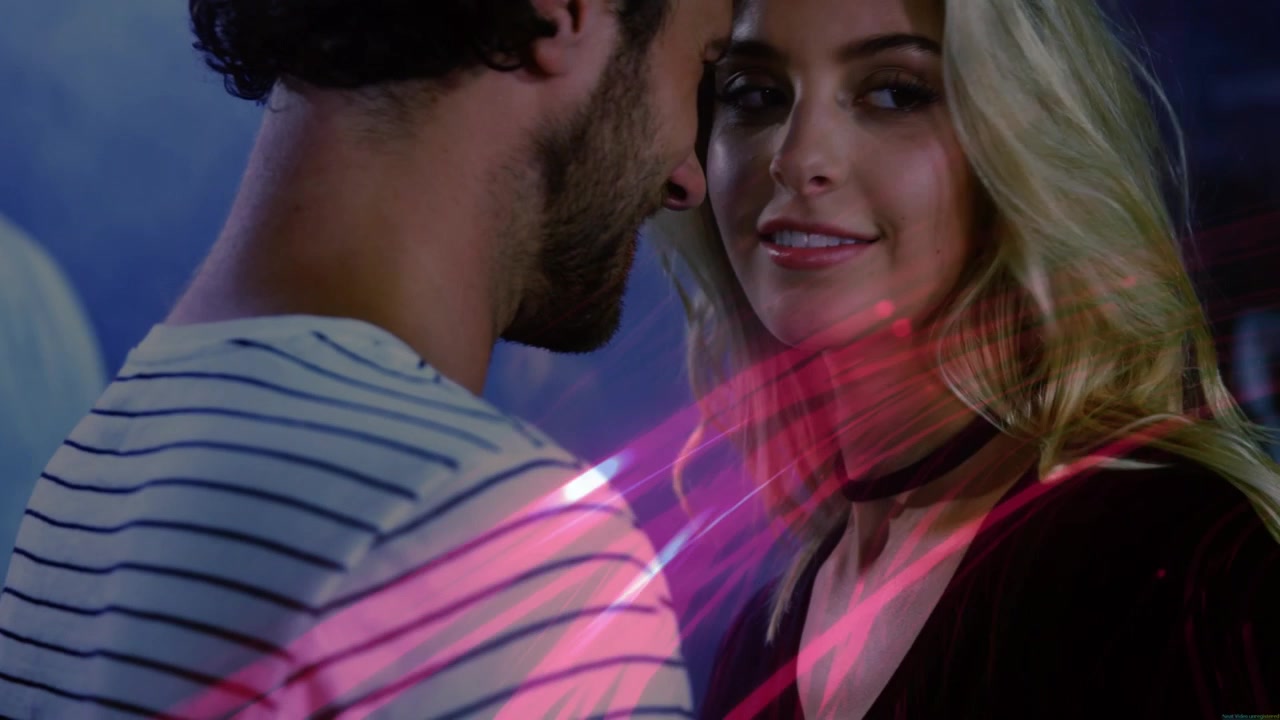 Man leaning in, whispering to woman in club, flirting, pink lasers tracing striped shirt and choker