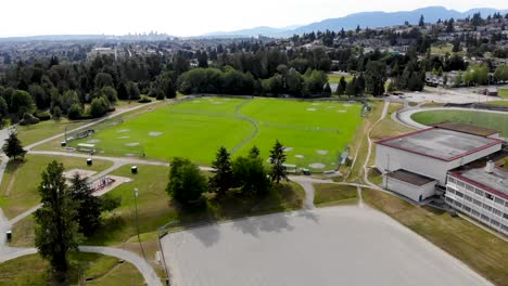 A-Drone-Shot-of-a-soccer-field-by-a-school