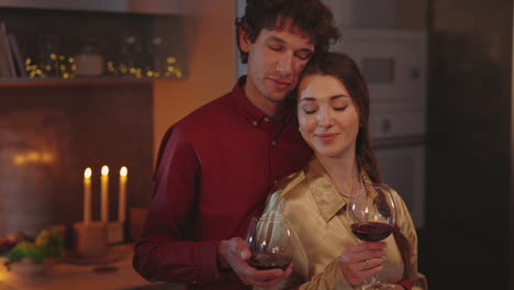 couple enjoying a romantic evening with wine
