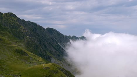 clouds in transfagarasan, dn7c paved mountain road in the carpathian mountains of romania