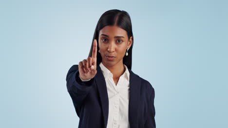 finger, no and face of business woman in studio