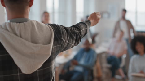 young businessman team leader shouting at colleagues in office meeting discussing performance in workplace