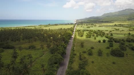 Aerial-View-Of-Land,-Road-and-Sea-In-St-Thomas-Jamaica